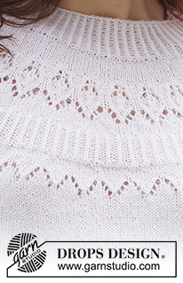 Mountain Frill / DROPS 230-35 - Knitted jumper with ¾ sleeves in DROPS Nord. Piece is knitted top down with round yoke and lace pattern on yoke. Size: S - XXXL