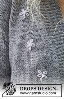 Shy Daisy Cardigan / DROPS 231-33 - Gestrickte Jacke in DROPS Merino Extra Fine. Die Arbeit wird von unten nach oben glatt rechts mit aufgestickten Blüten gestrickt. Größe S - XXXL.