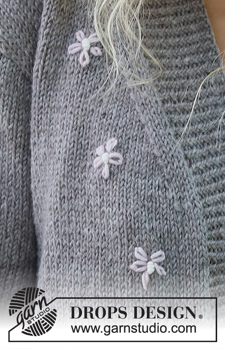 Shy Daisy Cardigan / DROPS 231-33 - Knitted jacket in DROPS Merino Extra Fine. Piece is knitted bottom up in stockinette stitch and embroidered flowers. Size: S - XXXL