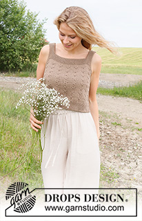 Midsummer's Day / DROPS 232-24 - Knitted top / singlet in DROPS Cotton Light. Piece is knitted bottom up with relief pattern. Size: S - XXXL