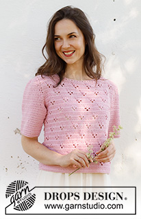 Hortense Top / DROPS 232-36 - Crocheted short-sleeve jumper in DROPS Cotton Merino. The piece is worked bottom up with lace pattern. Sizes S - XXXL.