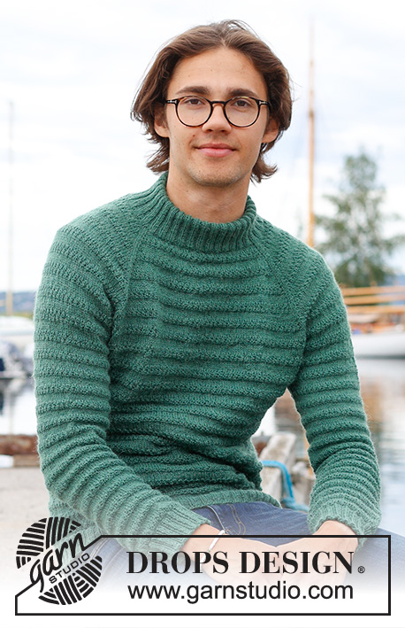 Green Harmony / DROPS 233-11 - Pánský raglánový pulovr pletený plastickým vzorem shora dolů z příze DROPS Nord. Velikost S - XXXL.