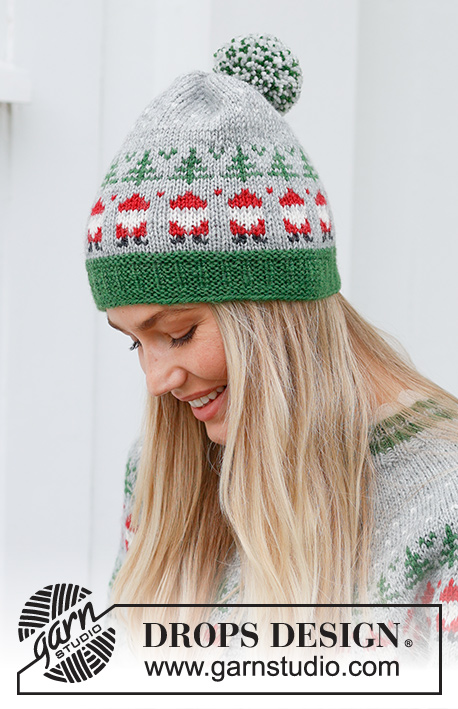 Christmas Time Hat / DROPS 234-62 - Bonnet tricoté en DROPS Karisma. Se tricote de bas en haut, avec jacquard Père Noël et sapin de Noël. Thème: Noël.