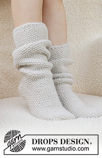 Snow White Socks / DROPS 234-73 - Strikkede sokker i DROPS Lima og DROPS Brushed Alpaca Silk. Arbeidet strikkes ovenfra og ned i perlestrikk. Størrelse 35 – 43. Tema: Jul.