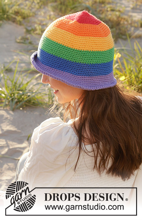 True Colours Hat / DROPS 238-19 - Crocheted hat in DROPS Paris. Piece is worked in the round top down with rainbow stripes. Size: S - XL