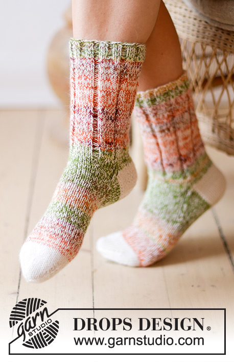 Watermelon Wanderers / DROPS 238-23 - Knitted socks in 2 strands DROPS Fabel. The piece is worked top down, with rib and stocking stitch. Sizes 35 - 43.