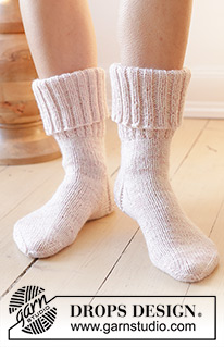 Splash into Spring / DROPS 238-35 - Knitted socks in 2 strands DROPS Nord. The piece is worked top down with rib and stocking stitch. Sizes 35 - 43.
