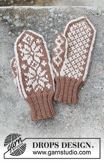 Snow Flake Mittens / DROPS 242-16 - Moufles tricotées en DROPS Nepal. Se tricotent avec jacquard nordique.