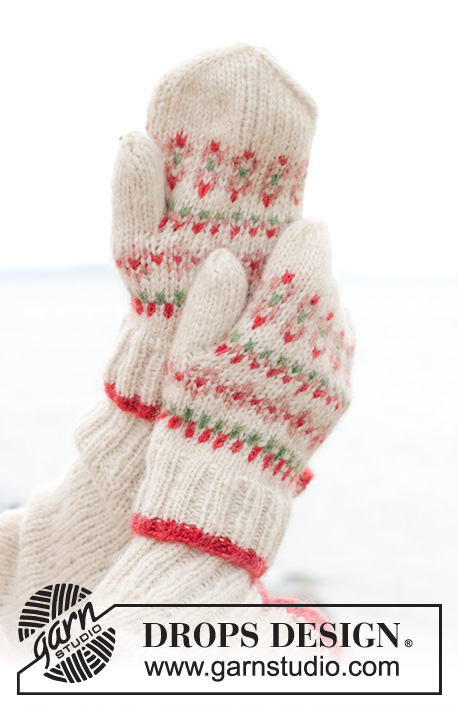 Something About Holly Mittens / DROPS 242-19 - Knitted mittens in DROPS Air. The piece is worked with multi-coloured pattern.