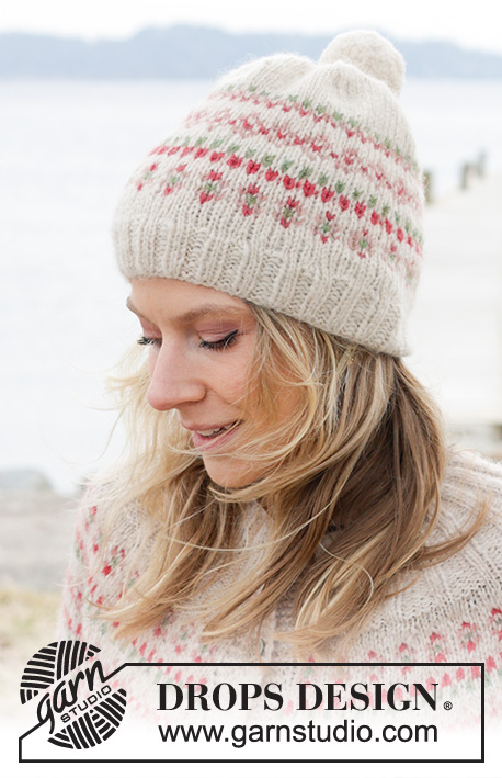 Something About Holly Hat / DROPS 242-20 - Knitted hat in DROPS Air. The piece is worked with multi-coloured pattern.