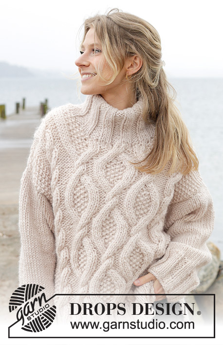 Cable Beach Sweater / DROPS 243-23 - Knitted over-sized sweater in DROPS Snow. The piece is worked top down with cables, split in sides and double neck. Sizes S - XXXL.