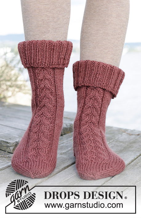 Balancing Act / DROPS 244-37 - Knitted half-length socks in DROPS Nepal. The piece is worked top down with double rib and cables. Sizes 35 – 43 = US : 4 ½ - 12 1/2.