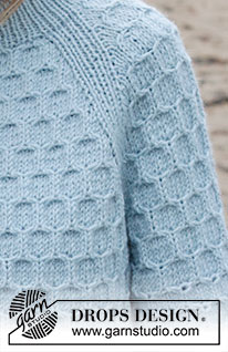 Mermaid Bay / DROPS 245-1 - Strikket genser i DROPS Nepal. Arbeidet strikkes ovenfra og ned med dobbel halskant, raglan, bikube mønster og splitt i sidene. Størrelse S - XXXL.