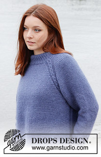 Moonlit Ocean / DROPS 245-13 - Knitted sweater in DROPS Merino Extra Fine and DROPS Kid-Silk. The piece is worked top down with double neck, raglan, cables and split in sides. Sizes S - XXXL.