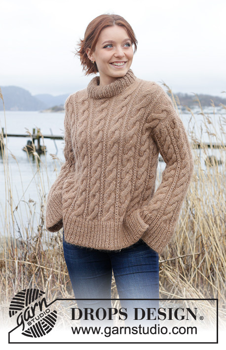 Cinnamon Swirls / DROPS 245-20 - Knitted sweater in DROPS Puna and DROPS Kid-Silk. The piece is worked top down with European/diagonal shoulders, cables, double neck and split in sides. Sizes S - XXXL.