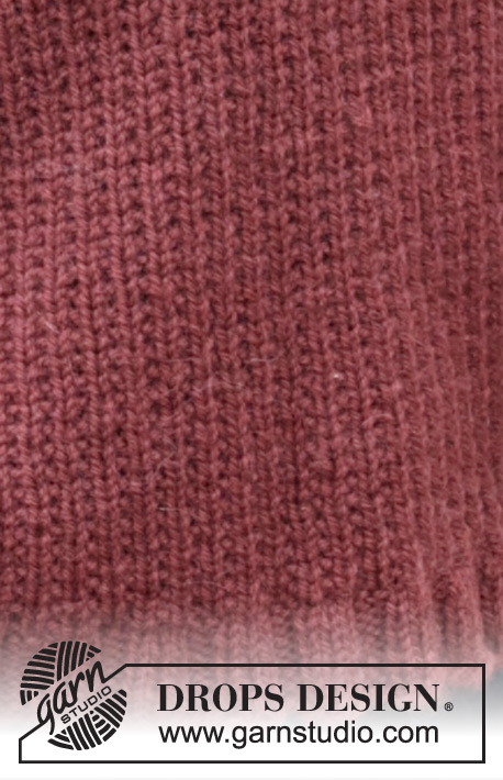 Rustic Berry Sweater / DROPS 245-26 - Gebreide trui in DROPS Nepal. Het werk wordt van onder naar boven gebreid met reliëfpatroon, diagonale schouders en hoge hals. Maten S - XXXL.