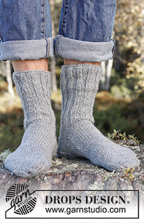 Rock the Sock / DROPS 246-34 - Knitted socks for men in 2 strands DROPS Fabel. The piece is worked top down with rib and stockinette stitch. Sizes 38 – 46 = US 6-12 1/2.
