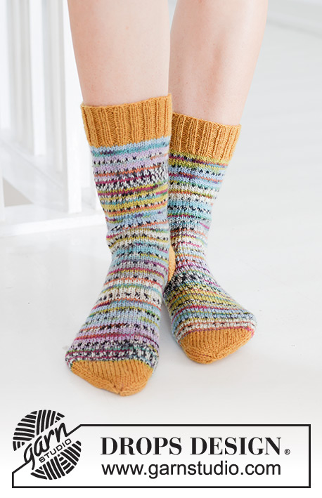Spring Carnival Socks / DROPS 247-16 - Knitted socks in DROPS Fabel. Piece is knitted top down in stocking stitch. Size 35 to 43