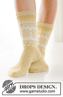 Easter Promenade Socks / DROPS 247-21 - Knitted socks in DROPS Nord. The piece is worked top down, with Nordic pattern and heel flap. Sizes 35 – 43. Theme: Easter.