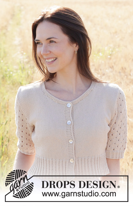 Sand Cove Cardigan / DROPS 248-28 - Knitted jacket in DROPS Safran. The piece is worked bottom up with round neck, short sewn-in sleeves, lace pattern, cables and I-cord. Sizes S - XXXL.