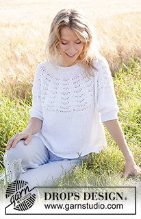 Peace Dove / DROPS 249-21 - Knitted jumper with ¾ sleeves in DROPS Belle or DROPS Cotton Light. Piece is knitted top down with round yoke and wave pattern on yoke. Size: S - XXXL