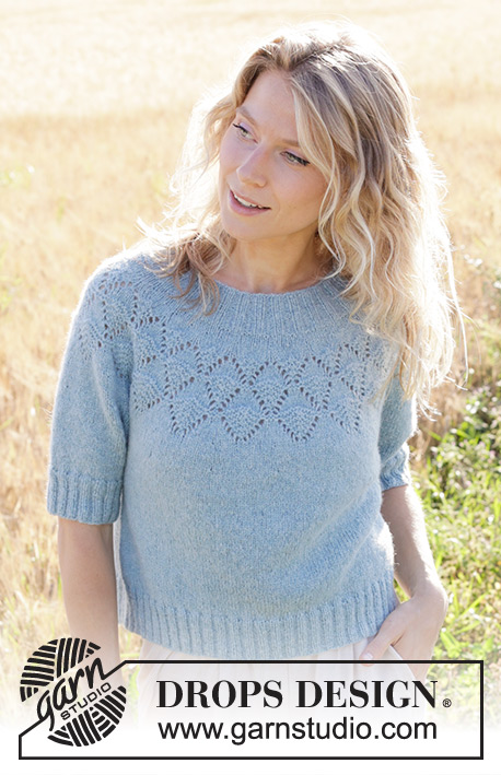 Blueberry Leaf / DROPS 249-9 - Knitted jumper in DROPS Sky or DROPS Merino Extra Fine. Piece is knitted top down with round yoke, lace pattern and short sleeves. Size: S - XXXL