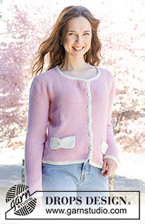 Jacqueline Cardigan / DROPS 250-29 - Knitted jacket in 2 strands DROPS Safran or 1 strand DROPS Paris. The piece is worked bottom up with moss stitch, sewn in puffed sleeves and pockets. Sizes S - XXXL.