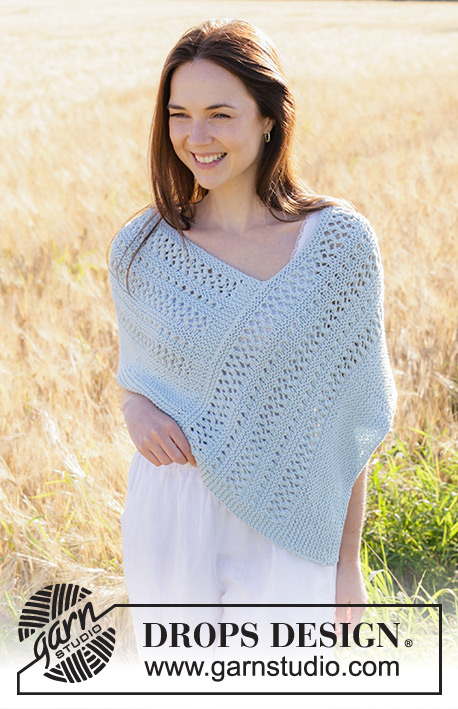 Coastal Dream / DROPS 250-32 - Knitted poncho in DROPS Paris. The piece is worked back and forth with garter stitch and lace pattern. Sizes S - XXXL.