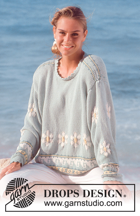 DROPS 29-14 - DROPS sweater with flower borders in “Muskat Soft”.
