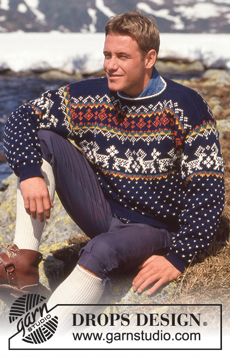 DROPS 32-23 - Sweter na drutach, z włóczki DROPS Karisma Superwash, z żakardem w płatki i renifery. Damski lub męski. Od S do L.