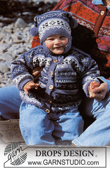 DROPS 39-18 - Pull ou veste DROPS pour enfant, bordures jacquard et bonnet assorti en Karisma. Du 2 au 11/12 ans.