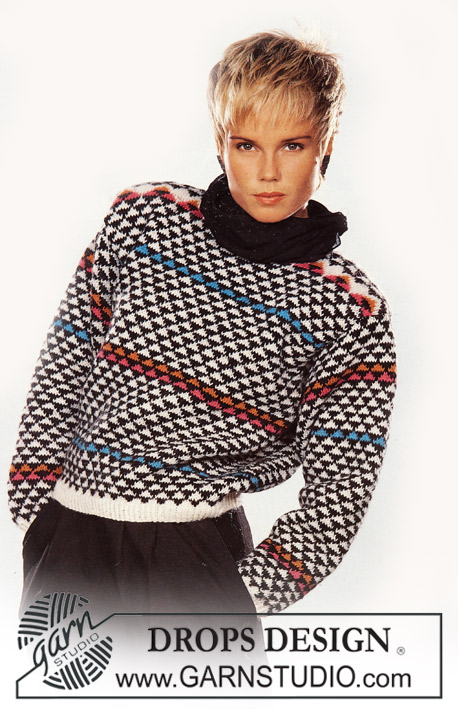 DROPS 4-2 - DROPS pulovr s trojúhelníkovým vzorem pletený z příze Karisma. 