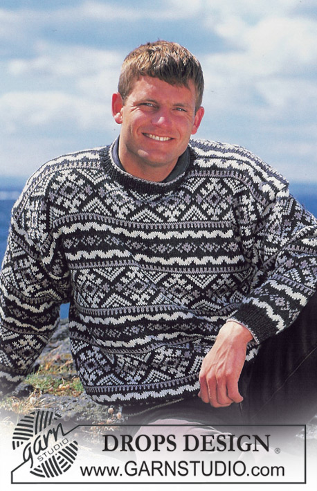 DROPS 40-18 - Męski sweter na drutach, z żakardem etnicznym, z włóczki DROPS Karisma. Od S do L.