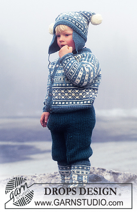 DROPS 47-9 - Rozpinany dziecięcy sweter na drutach z żakardem fana, czapka i skarpetki na drutach w komplecie, z włóczki DROPS Karisma Superwash. Od 3 /4 lat do 13/14 lat.