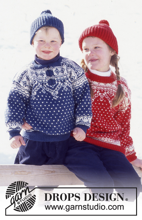 DROPS 52-28 - DROPS Sweater and hat for children in Karisma Superwash with snow crystals and dots.
