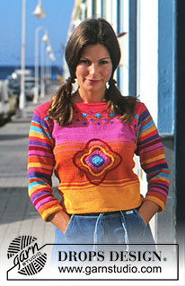 That Seventies Spell / DROPS 68-22 - Farverig DROPS bluse i «Muskat» med forskellige mønstre og ¾ lange ærmer.