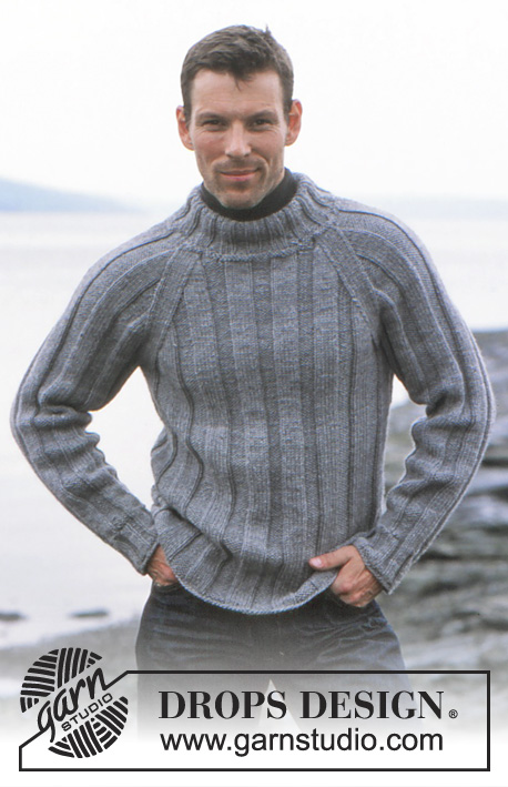 Of The Sea / DROPS 85-2 - Męski sweter na drutach, z reglanowymi rękawami i ściągaczem, z włóczki DROPS Alaska. Szalik na drutach z włóczki DROPS Snow. Od 12 lat do rozmiaru XXL.