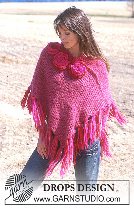 DROPS 93-49 - DROPS Poncho with tassels and crochet flowers 