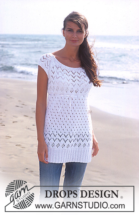 Lovely in Lace / DROPS 94-24 - DROPS Langes Top mit Lochmuster in ”Safran”
