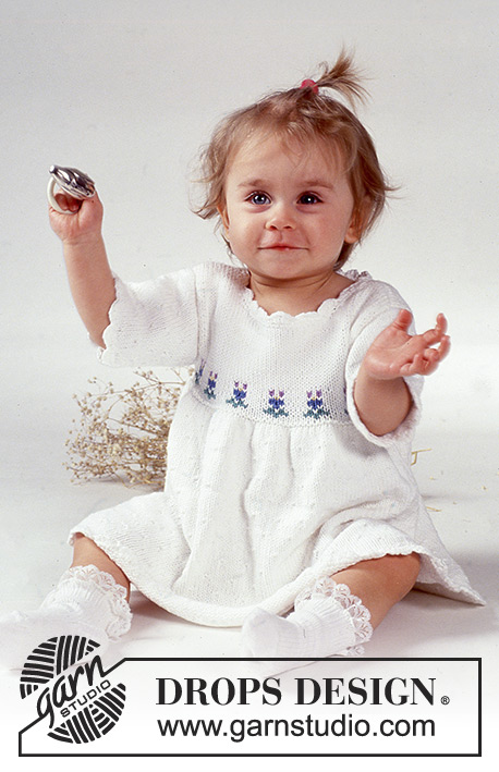 Little Lily / DROPS Baby 1-6 - DROPSi lühikeste varrukate ja lilledisainiga kleit lõngast Safran“