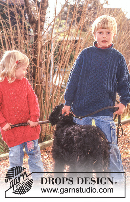 Boy Blue / DROPS Baby 10-14 - Strikket genser til barn i DROPS Karisma. Arbeidet strikkes med strukturmønster og flettemønster. Størrelse 3 - 8 år.