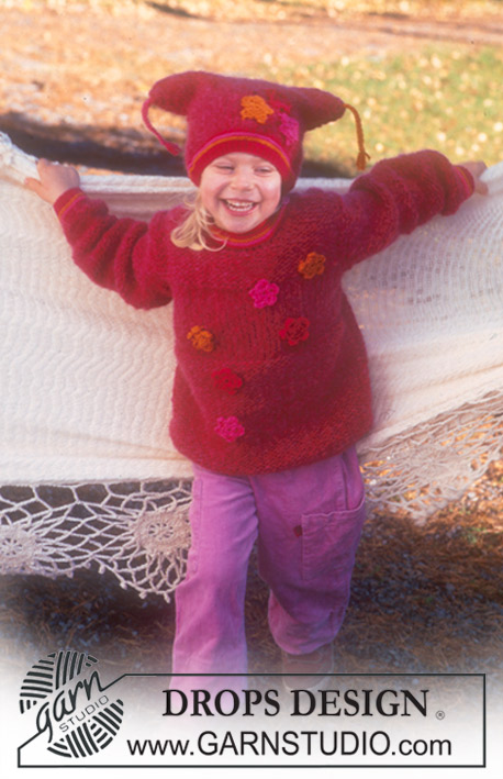DROPS Baby 10-16 - Strikket sett med genser og lue til barn i DROPS Highlander eller DROPS Air, DROPS Paris, DROPS Alaska og DROPS Karisma. Arbeidet strikkes med struktur og blomster hekles. Størrelse 1 - 6 år.