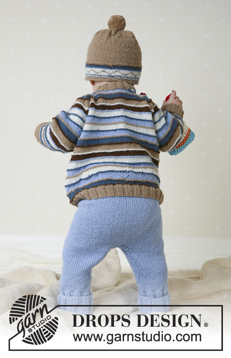 Swab the Deck / DROPS Baby 13-12 - DROPS Setje bestaande uit: Trui met strepen en raglanmouwen, broekje, muts en knuffel van Alpaca. Maat 1/3 maanden - 3/4 jaar.