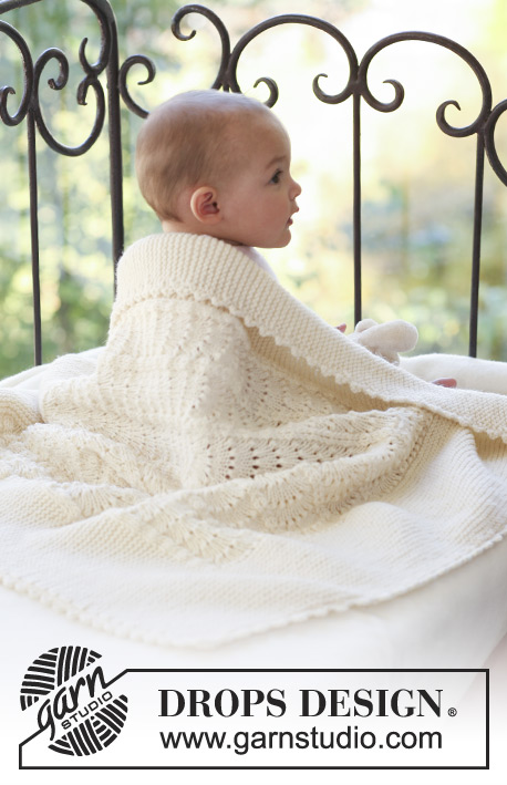 Princess Chantilly / DROPS Baby 18-30 - Knitted baby blanket with wave pattern in DROPS Merino Extra Fine