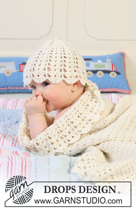 Sweet Buttercup Blanket / DROPS Baby 19-6 - Settiin kuuluu: Vauvan ja lapsen virkattu peitto leveällä viuhkakuvioisella reunuksella ja vauvan ja lapsen myssy DROPS BabyMerino -langasta. Teema: Vauvanpeitto