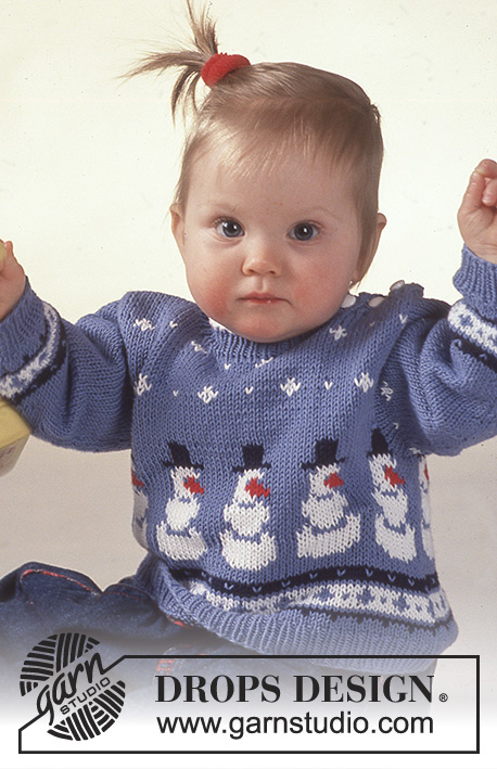 Fun with Frosty / DROPS Baby 2-8 - Świąteczny sweter na drutach z żakardem w bałwanki, skarpetki i czapka z włóczki DROPS Camelia.