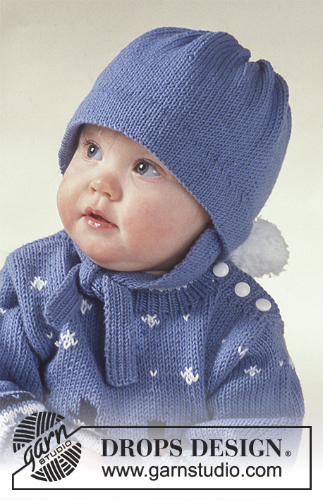 Fun with Frosty / DROPS Baby 2-8 - Świąteczny sweter na drutach z żakardem w bałwanki, skarpetki i czapka z włóczki DROPS Camelia.