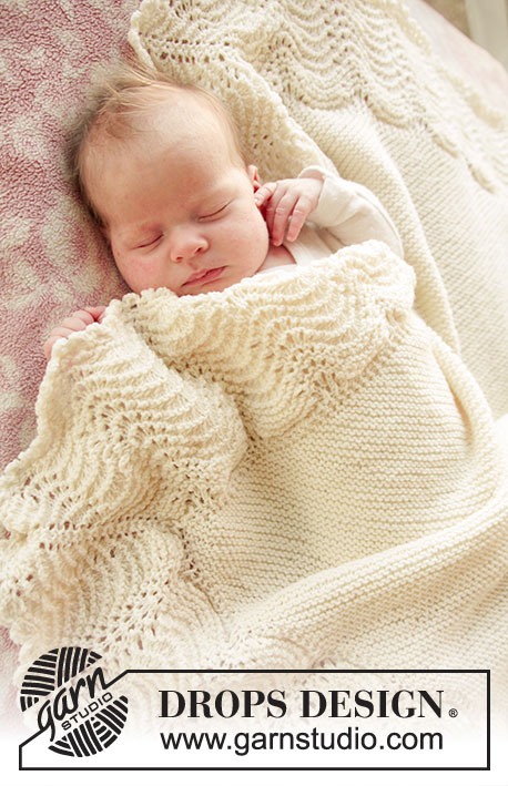 Baby Bliss / DROPS Baby 25-2 - Retstrikket babytæppe med kant i bølgemønster i DROPS BabyMerino