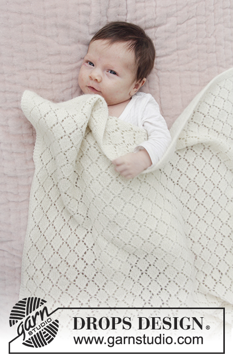 Lay Down / DROPS Baby 29-8 - Babytæppe med hulmønster. Arbejdet er strikket i DROPS BabyMerino.