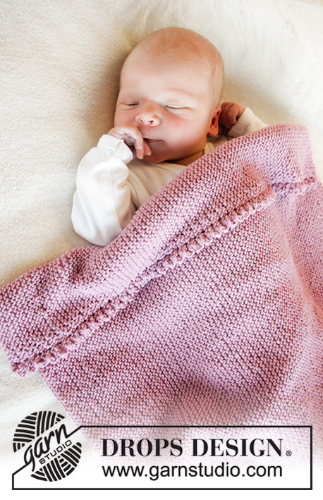 Small Dreams / DROPS Baby 33-15 - Gebreide deken voor baby in DROPS BabyMerino. Het werk wordt overdwars gebreid in ribbelsteek en kantrand. Maat 45 x 52 cm (65 x 80 cm). Thema: babydeken